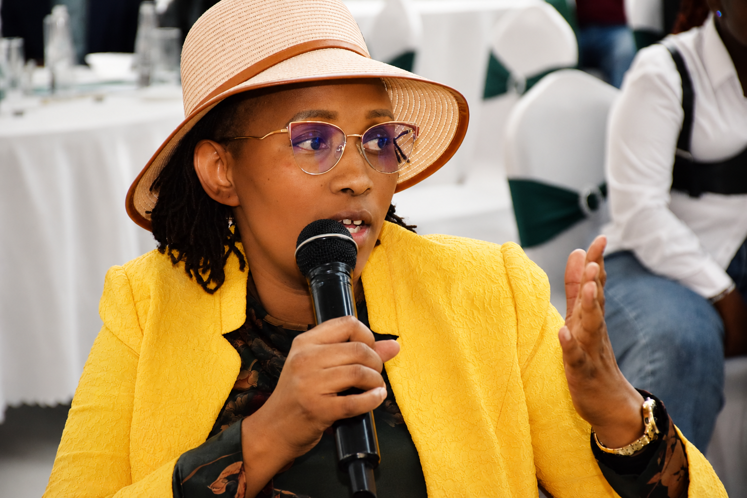 Close up of Wanjiru Kibe addressing the room at the forum